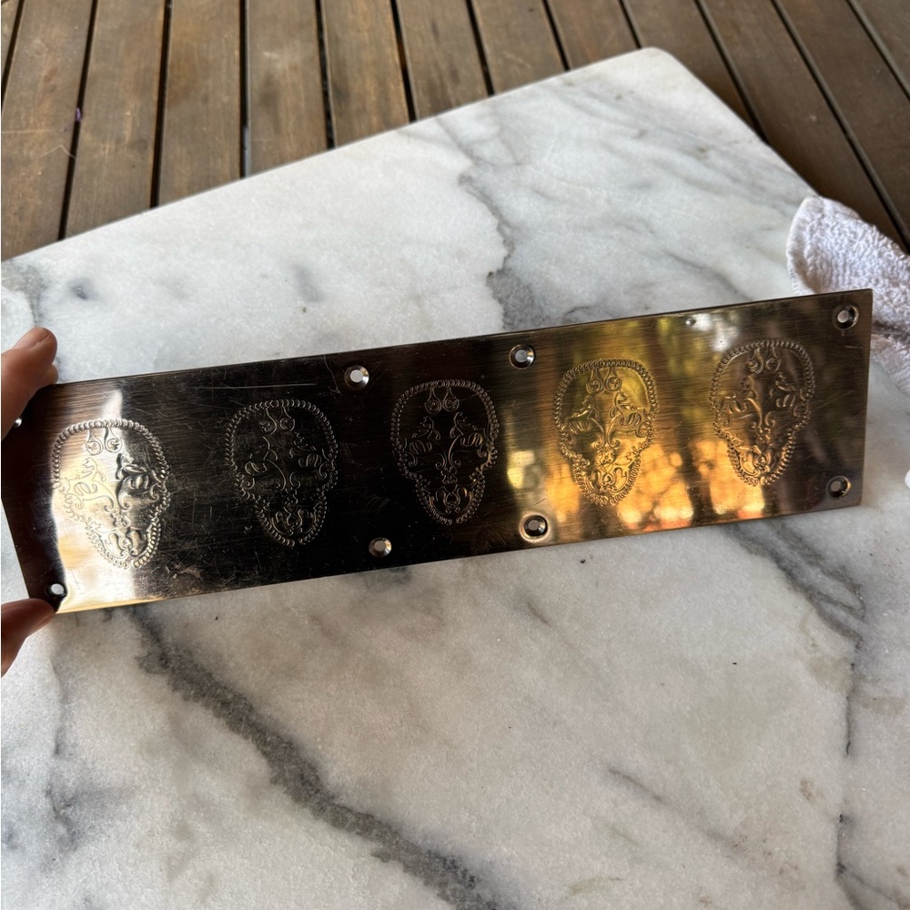 Thomas Wylde wall/ door plaque. Gunmetal tone w/ iconic Thomas Wylde  skull.